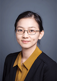 Pei Dong wears a mustard-yellow shirt, dark suit and glasses in her faculty profile for the Department of Mechanical Engineering.