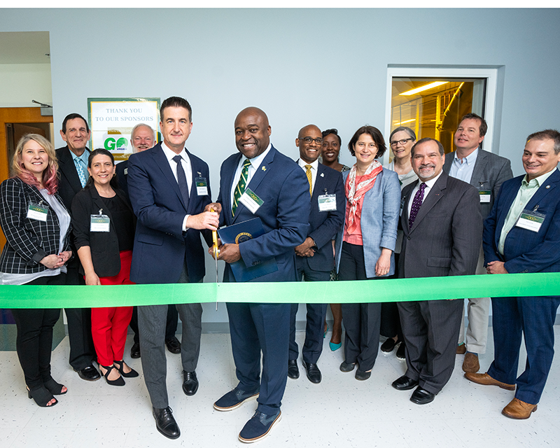 Gregory Washington and attendees at the Nanofabrication Facility grand opening