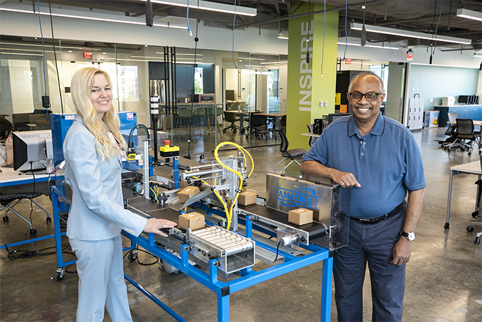 The innovation lab at the Arlington Campus with Liza Durant and Professor Duminda Wijesekera.