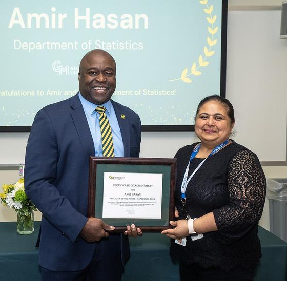 George Mason President Gregory Washington and Amir Hasan, September Employee of the Month