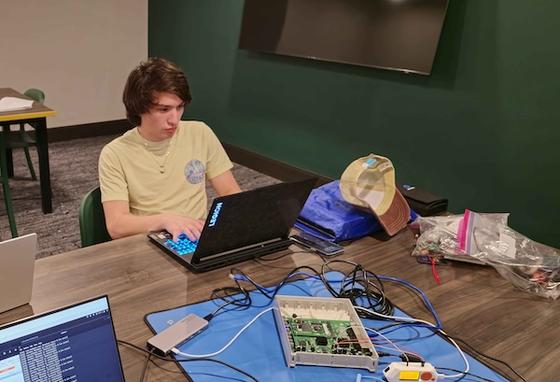 Club president Dylan Knoff working on routers. Photo provided.