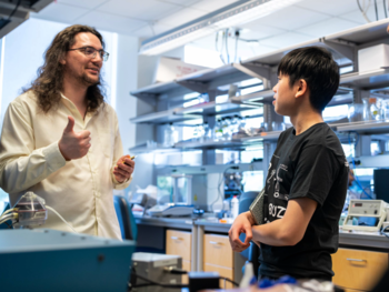 Doctoral student Dylan Scarton introduces campers to DNA origami.