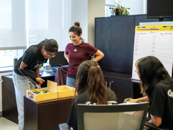 Assistant Research Professor Shirin Movaghgharnezhad leads an activity where students activated and recorded muscle movement on each other.